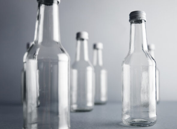 Empty glass cocoktail bottle with white cap mockup set