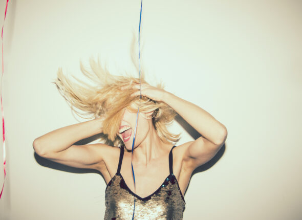 happy-young-girl-dancing-party